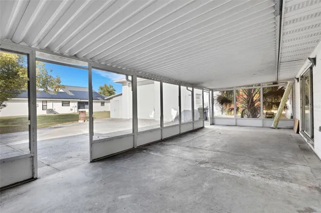 a view of an empty room with entrance gate