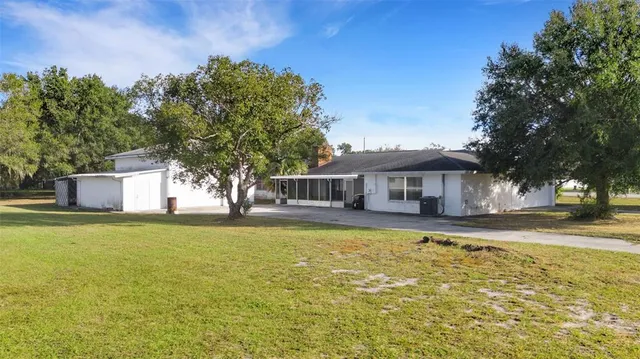 a front view of a house with swimming pool