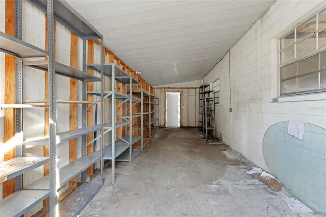 front view of a brick building with many windows