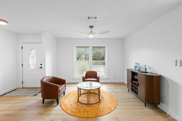 a workspace with furniture and window