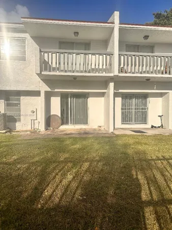 a view of pool and porch