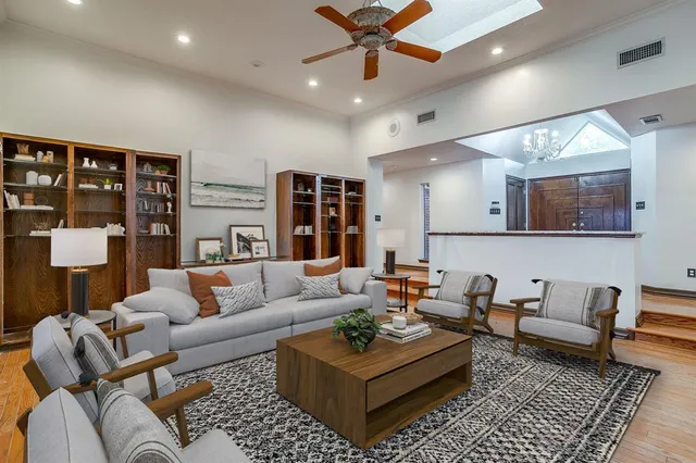 a living room with furniture and a rug