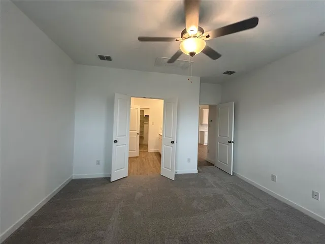 a kitchen with stainless steel appliances a sink stove and refrigerator
