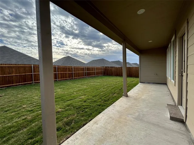 a bathroom with a shower and closet