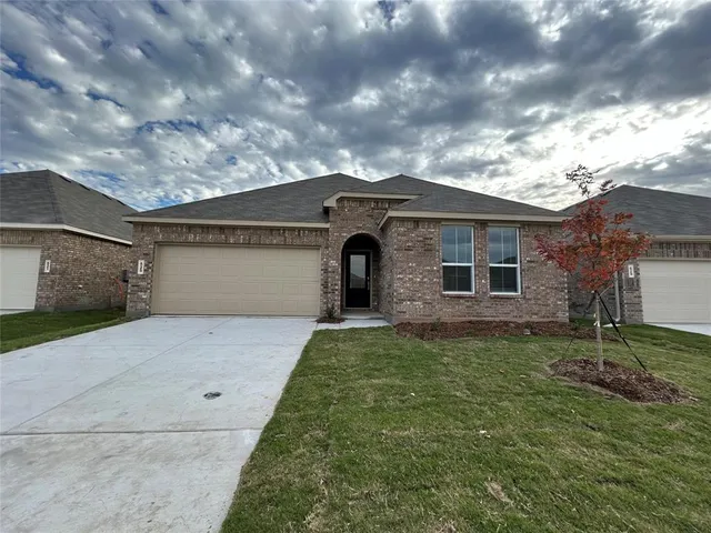 a bathroom with a double vanity sink and mirror