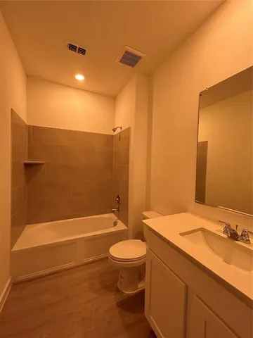 an empty room with a empty space and windows