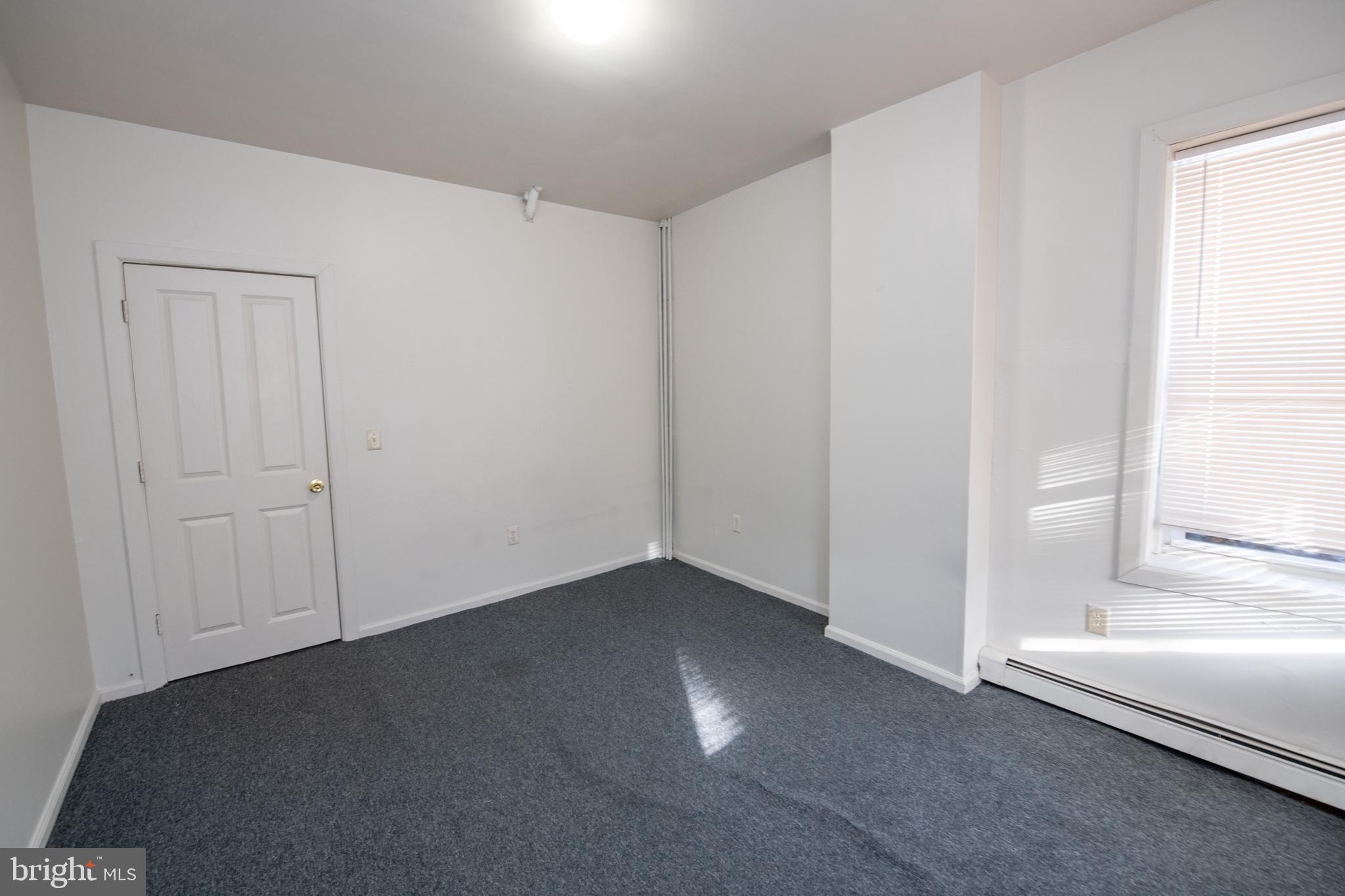 805 Prospect Street Trenton, NJ 08618 - Photo 11 of 31 a view of empty room with window