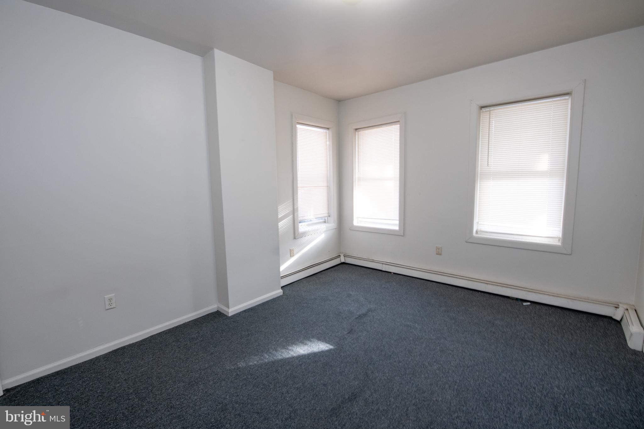 805 Prospect Street Trenton, NJ 08618 - Photo 12 of 31 an empty room with windows