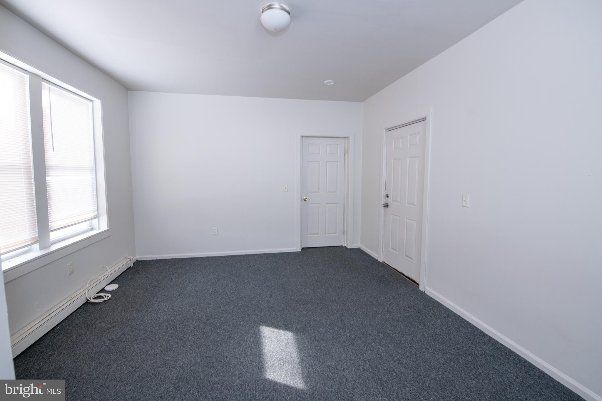 805 Prospect Street Trenton, NJ 08618 - Photo 16 of 31 an empty room with windows