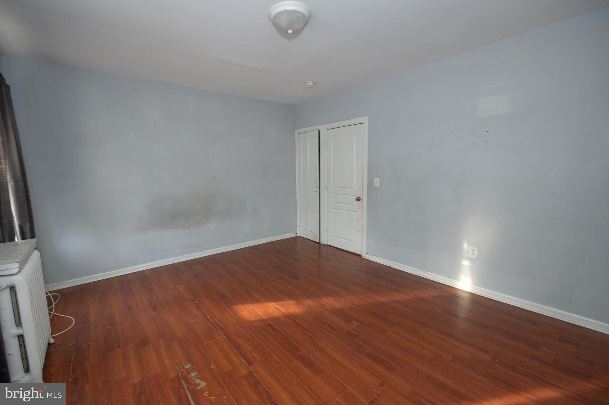 805 Prospect Street Trenton, NJ 08618 - Photo 27 of 31 a view of an empty room with wooden floor