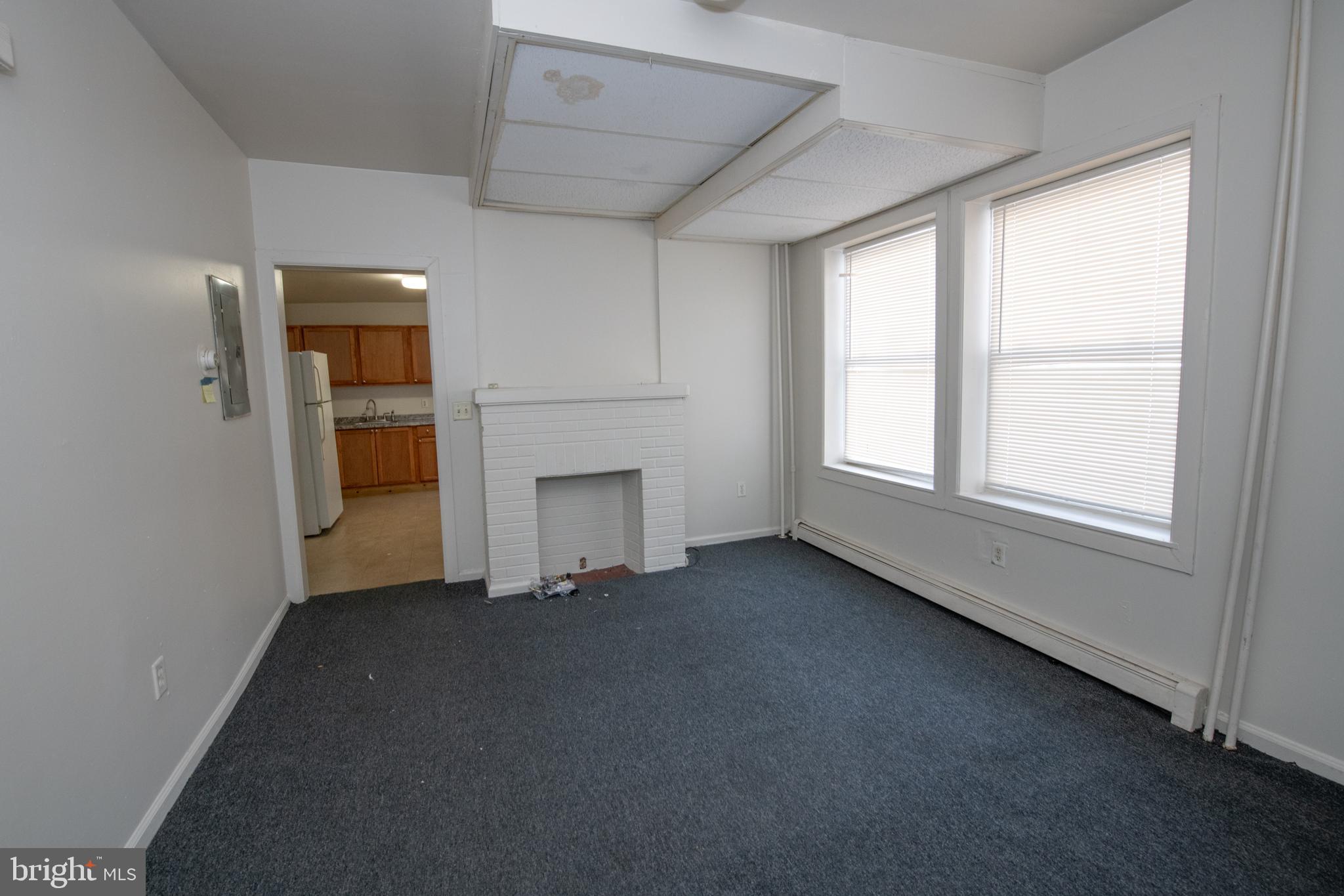 805 Prospect Street Trenton, NJ 08618 - Photo 9 of 31 an empty room with windows