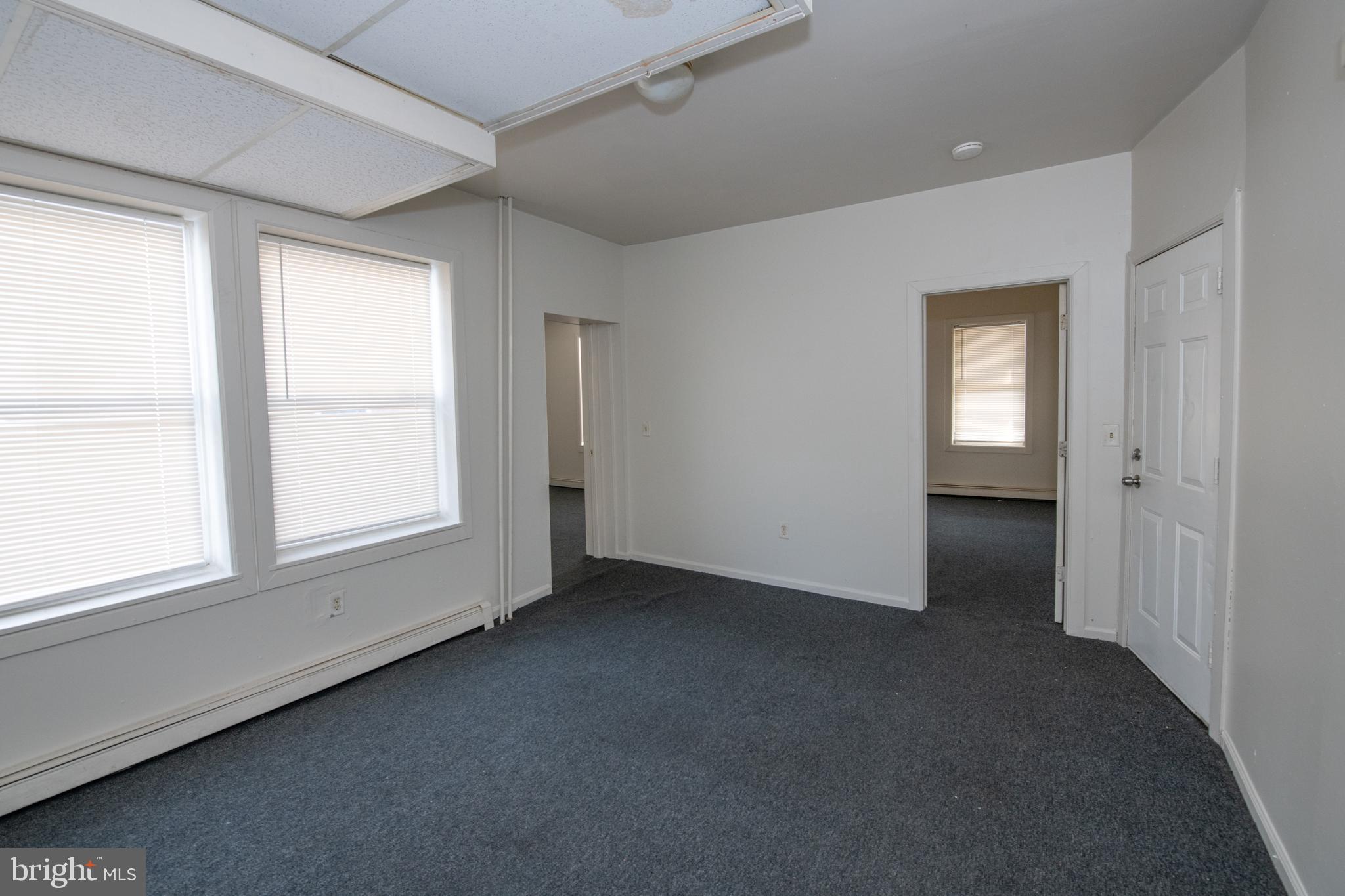 805 Prospect Street Trenton, NJ 08618 - Photo 10 of 31 an empty room with windows