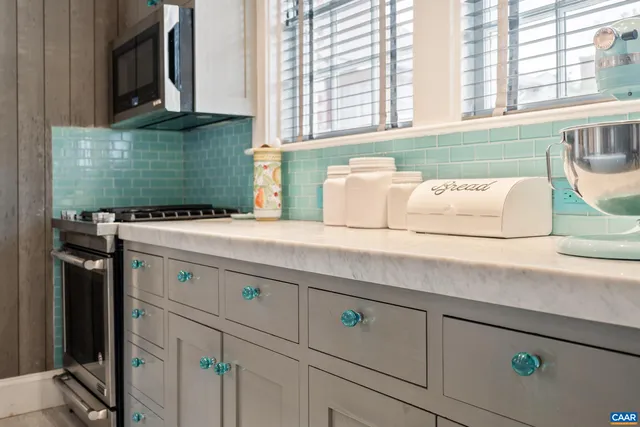 a bed room with a bed and a window