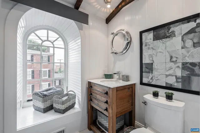 a view of balcony with outdoor seating and wooden floor