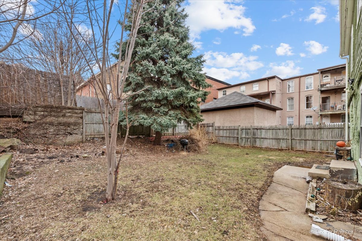 58 South Geneva Street Elgin, IL 60120 - Photo 21 of 24 a view of a backyard