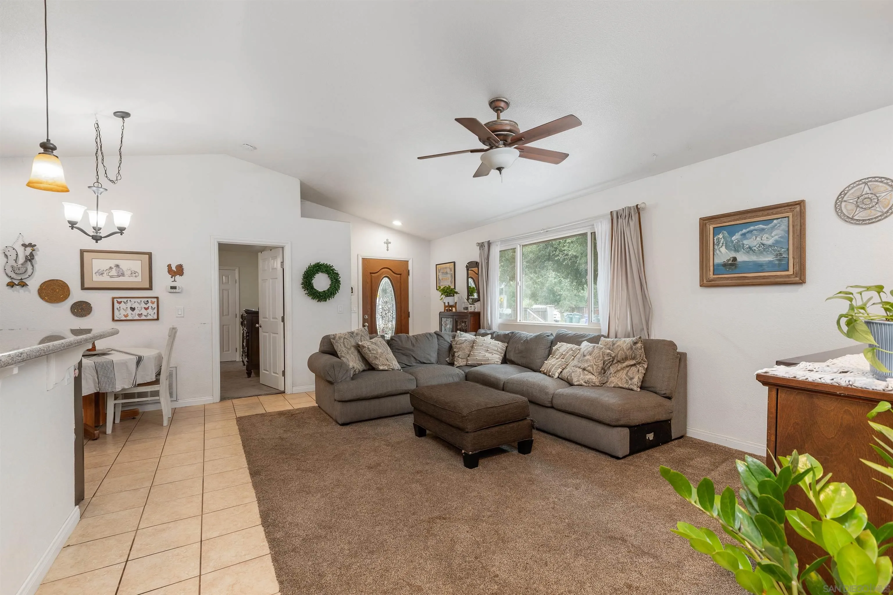 15990 El Monte Road Lakeside, CA 92040 - Photo 8 of 36 a living room with furniture and a window