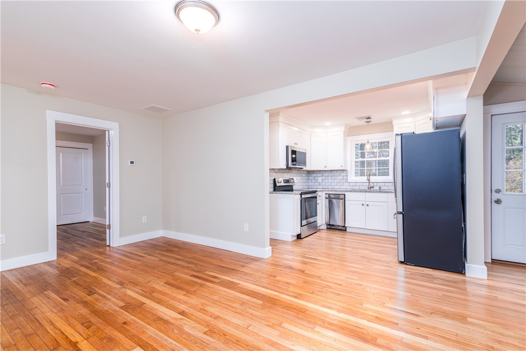 251 S Road South Kingstown, RI 02879 - Photo 10 of 22 Front bedroom through door on left.