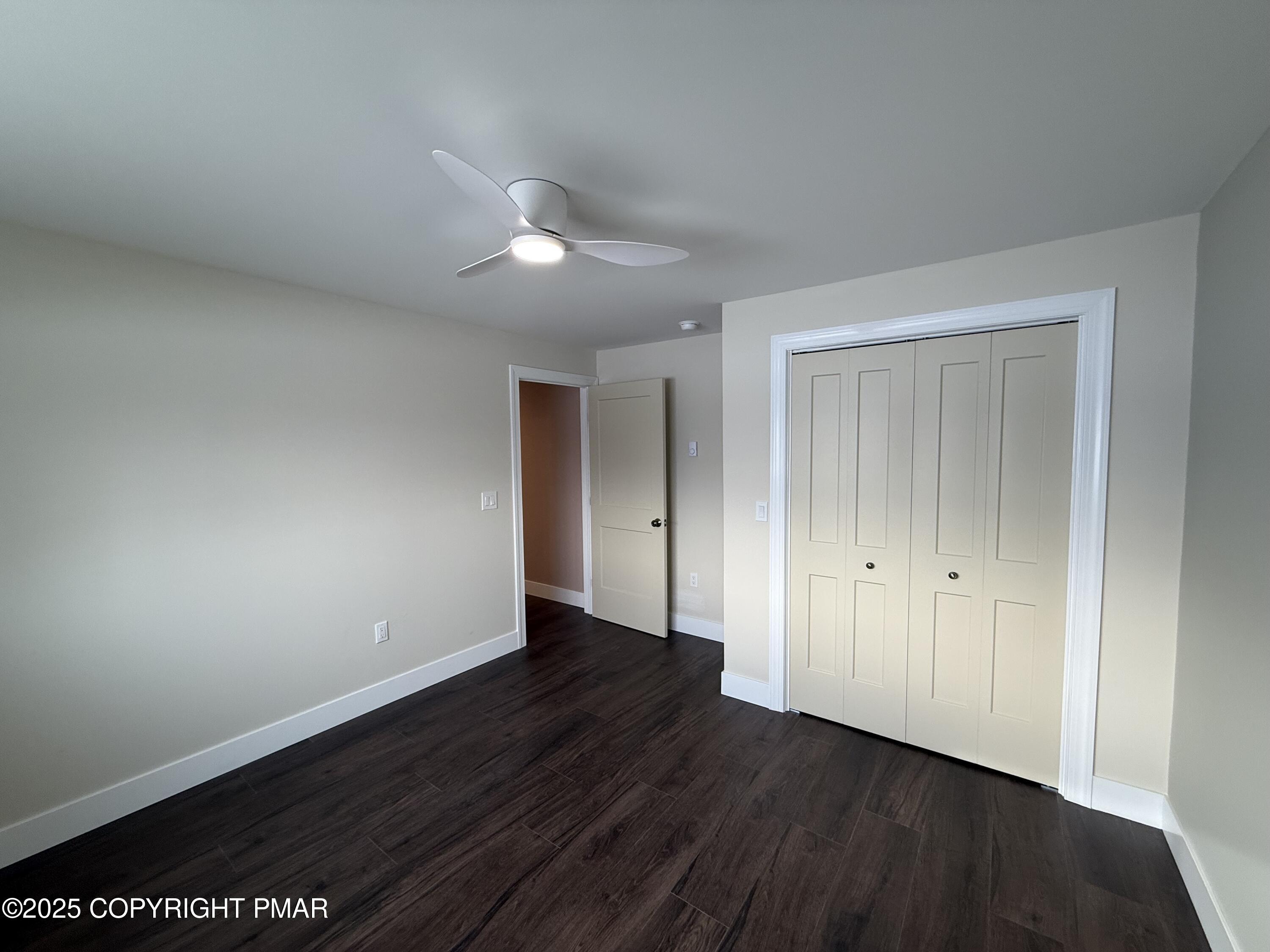 1270 Franklin Street Old Forge, PA 18518 - Photo 20 of 30 a view of an empty room with wooden floor