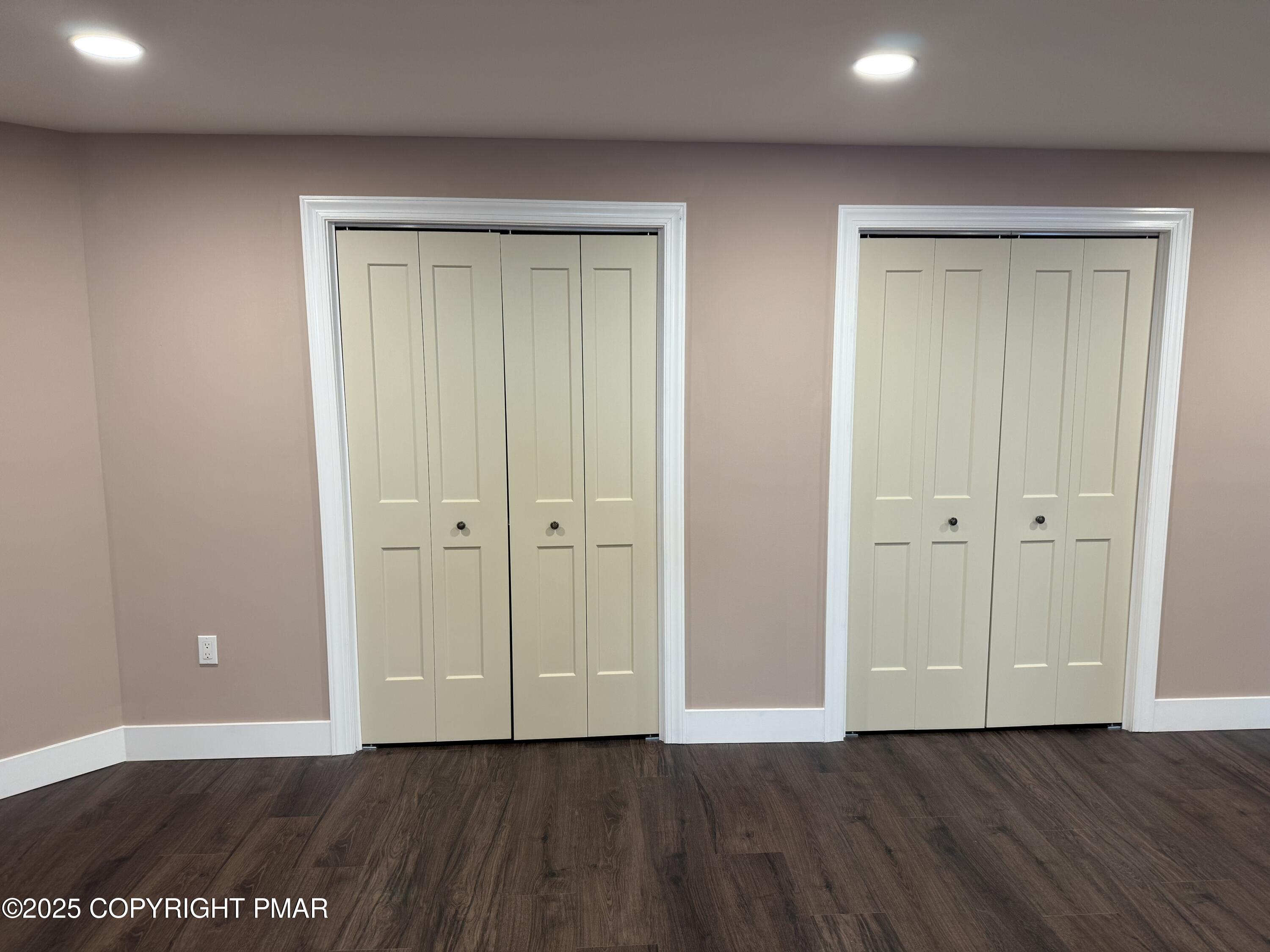 1270 Franklin Street Old Forge, PA 18518 - Photo 23 of 30 a view of an empty room with wooden floor and closet