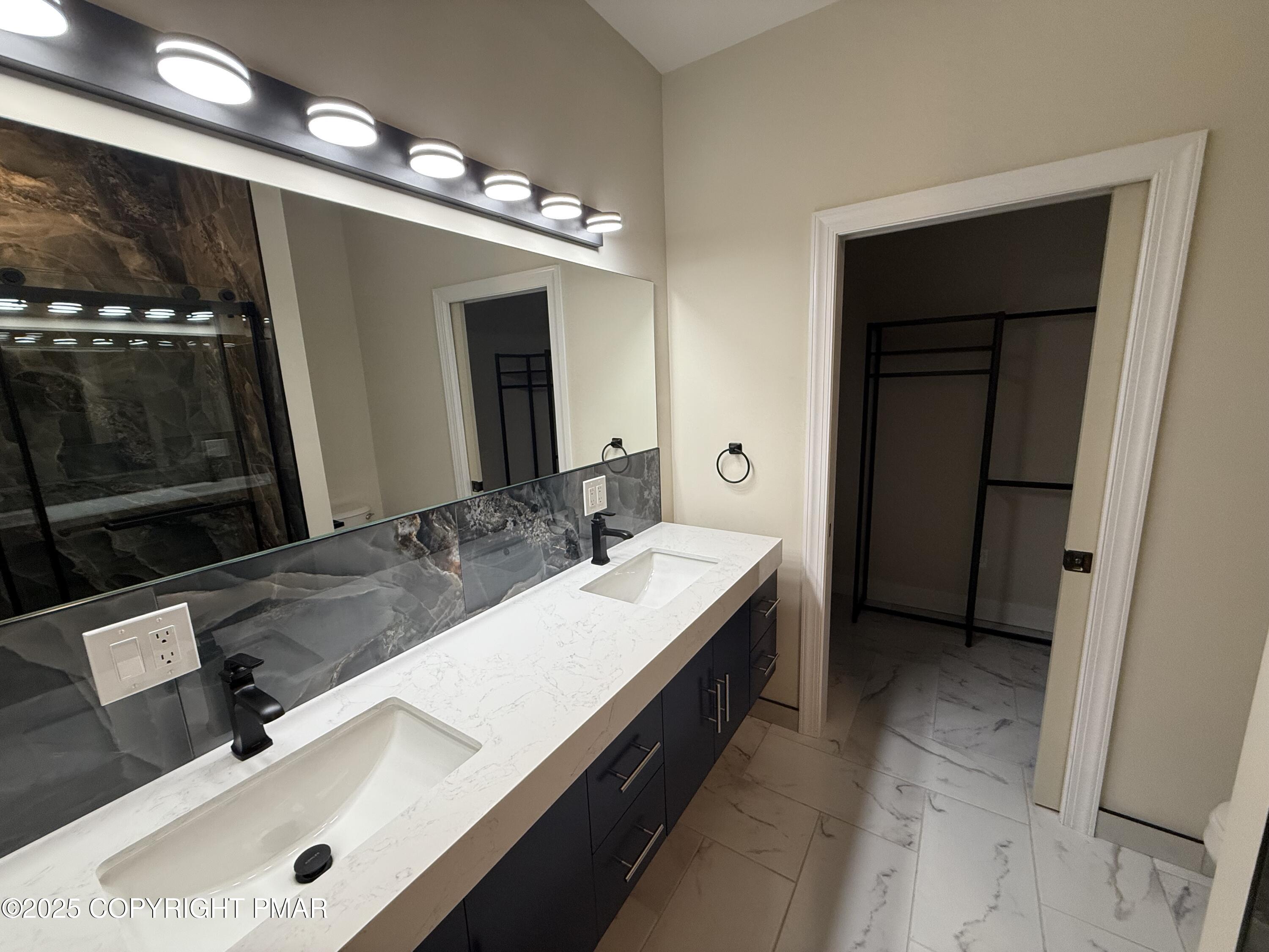 1270 Franklin Street Old Forge, PA 18518 - Photo 27 of 30 a bathroom with a sink double vanity and a mirror