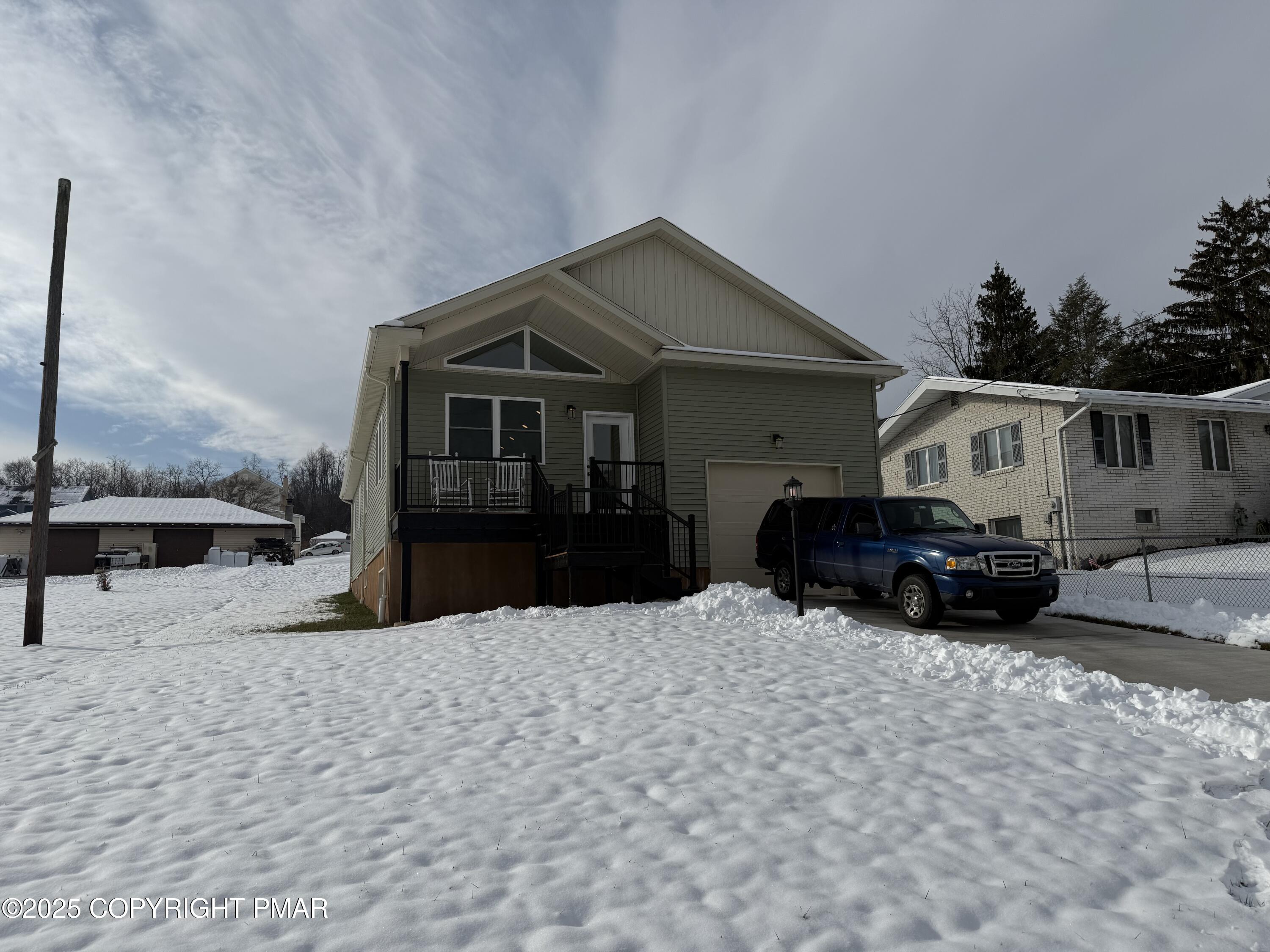 1270 Franklin Street Old Forge, PA 18518 - Photo 3 of 30 a view of a house with a snow in the yard