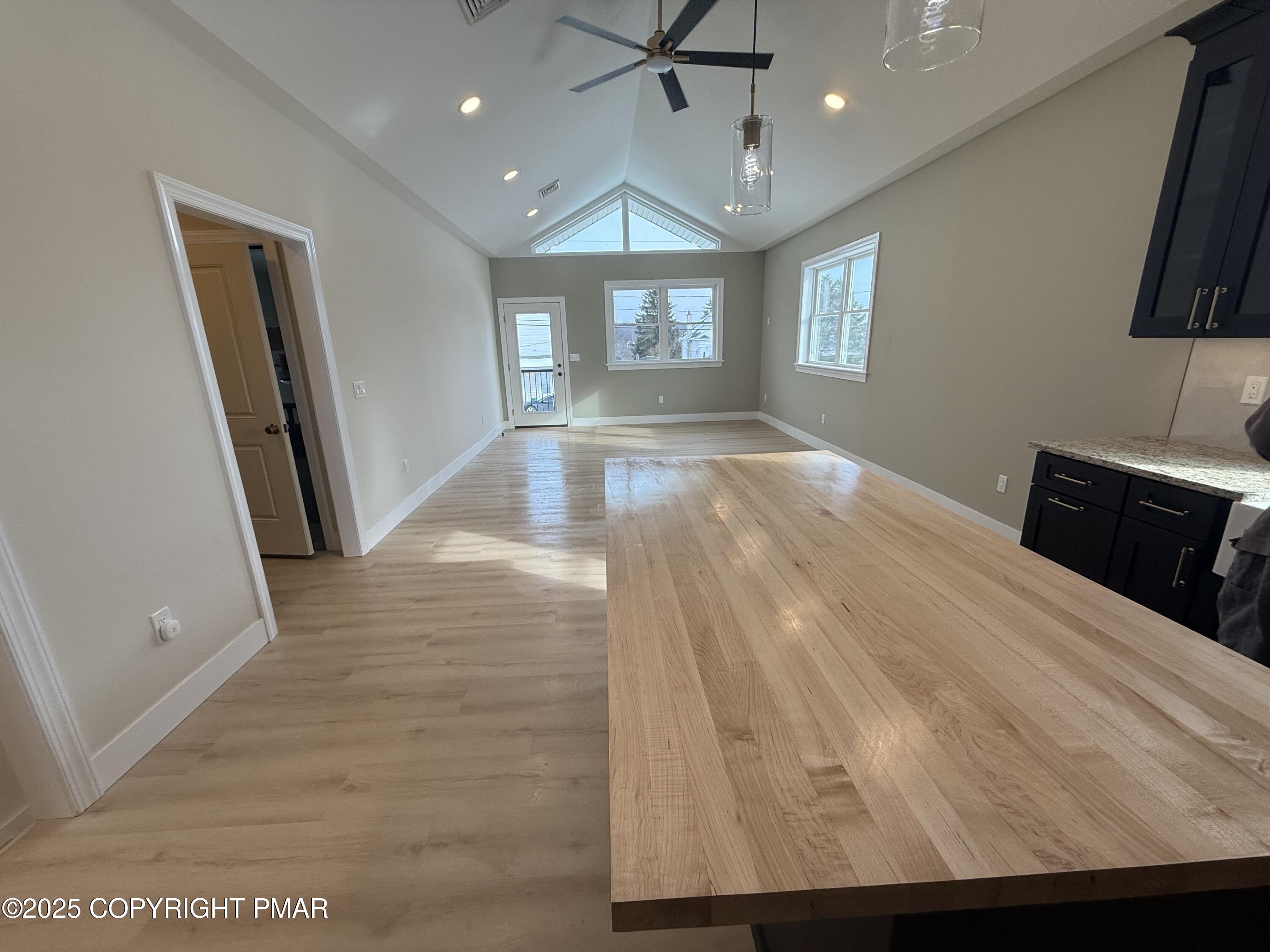 1270 Franklin Street Old Forge, PA 18518 - Photo 7 of 30 a view of empty room with window and wooden floor