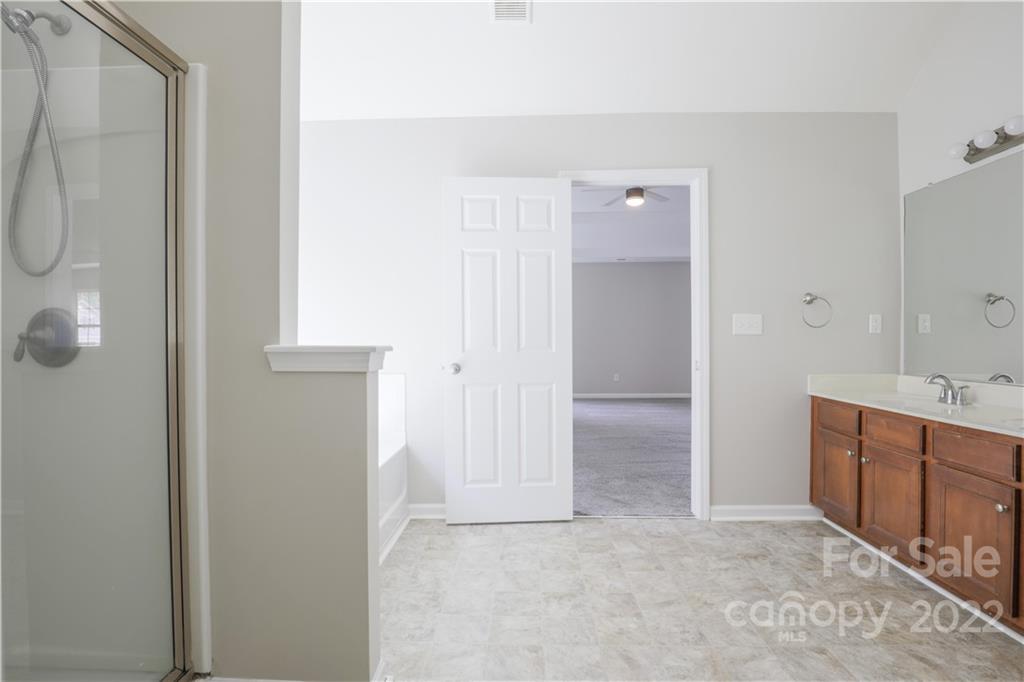 328 Wellridge Drive Fort Mill, SC 29708 - Photo 18 of 23 a view of bathroom with a sink mirror and window