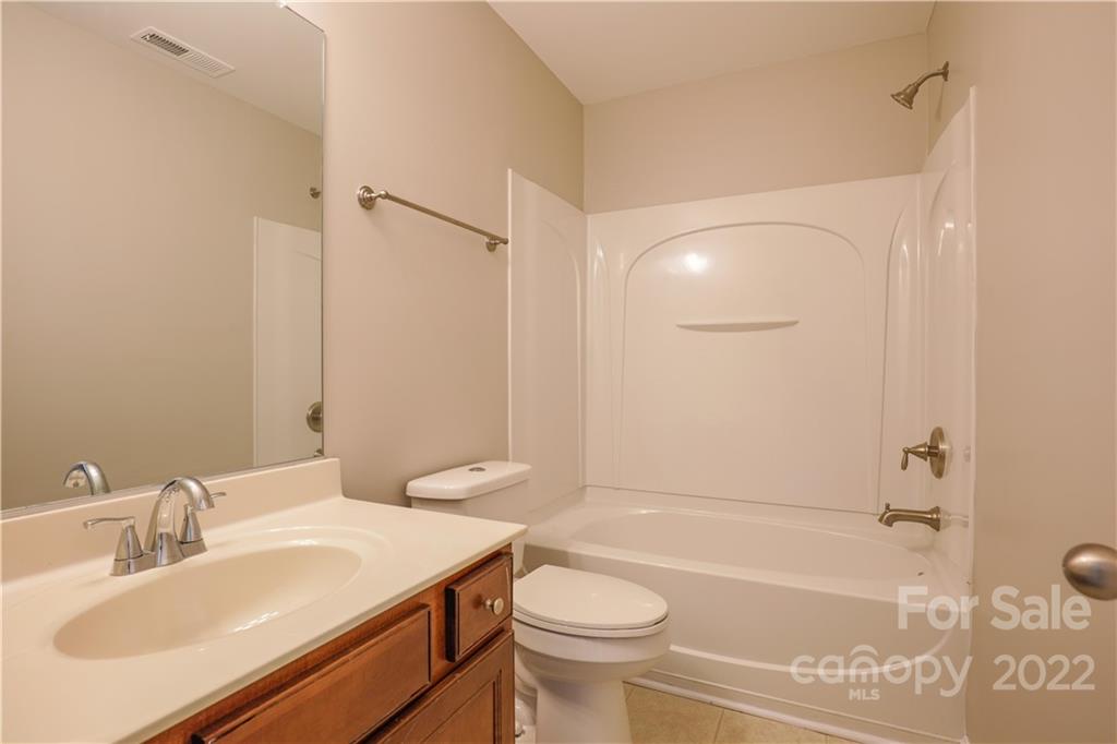328 Wellridge Drive Fort Mill, SC 29708 - Photo 20 of 23 a bathroom with a sink a toilet and shower