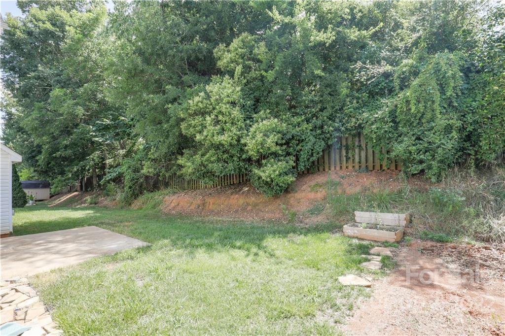 328 Wellridge Drive Fort Mill, SC 29708 - Photo 21 of 23 a backyard of a house with a yard and outdoor seating
