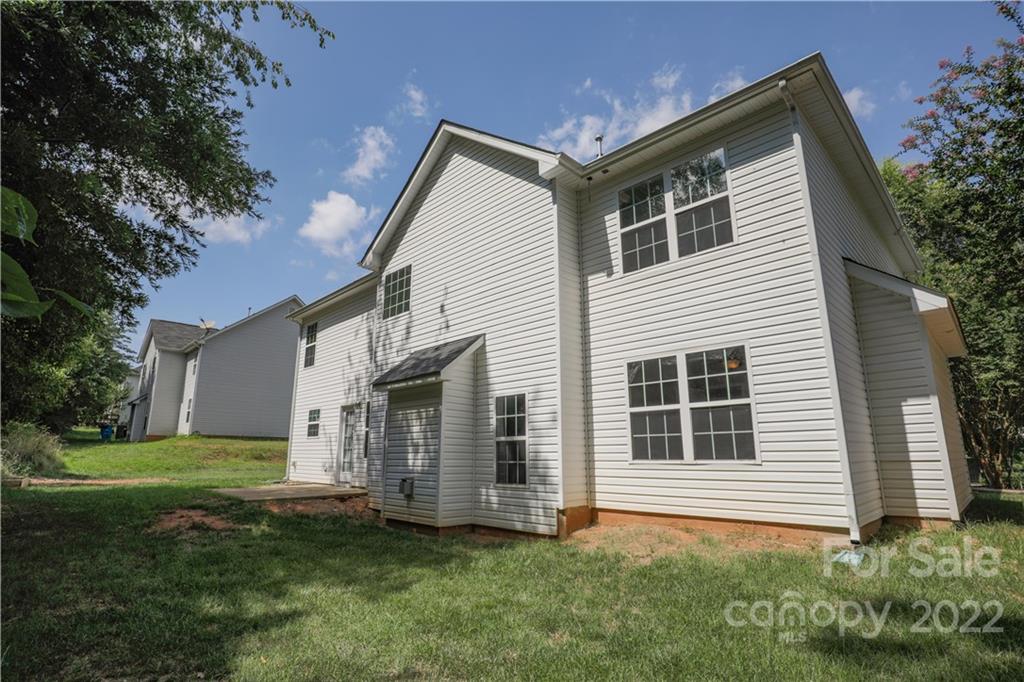 328 Wellridge Drive Fort Mill, SC 29708 - Photo 22 of 23 a view of house with backyard