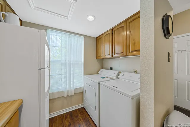 a utility room with dryer and washer