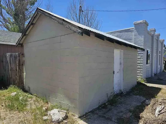 a view of a yard with trees