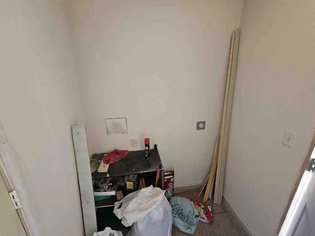 a room with furniture and wooden floor