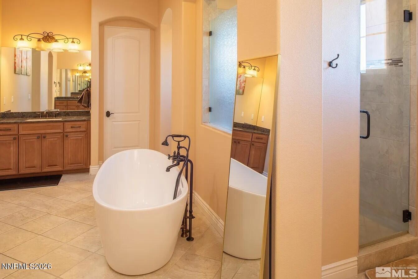 3945 Aspen Reno, NV 89511 - Photo 11 of 21 a bathroom with a sink toilet and shower