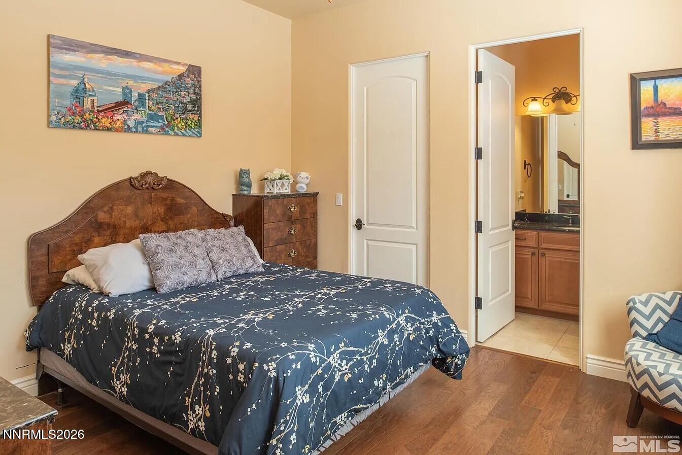 3945 Aspen Reno, NV 89511 - Photo 15 of 21 a large bed sitting in a bedroom and a dresser