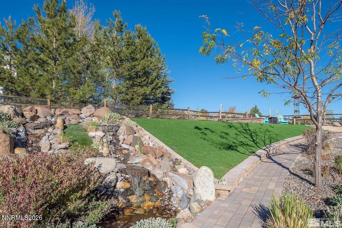 3945 Aspen Reno, NV 89511 - Photo 20 of 21 a view of a street with a tree
