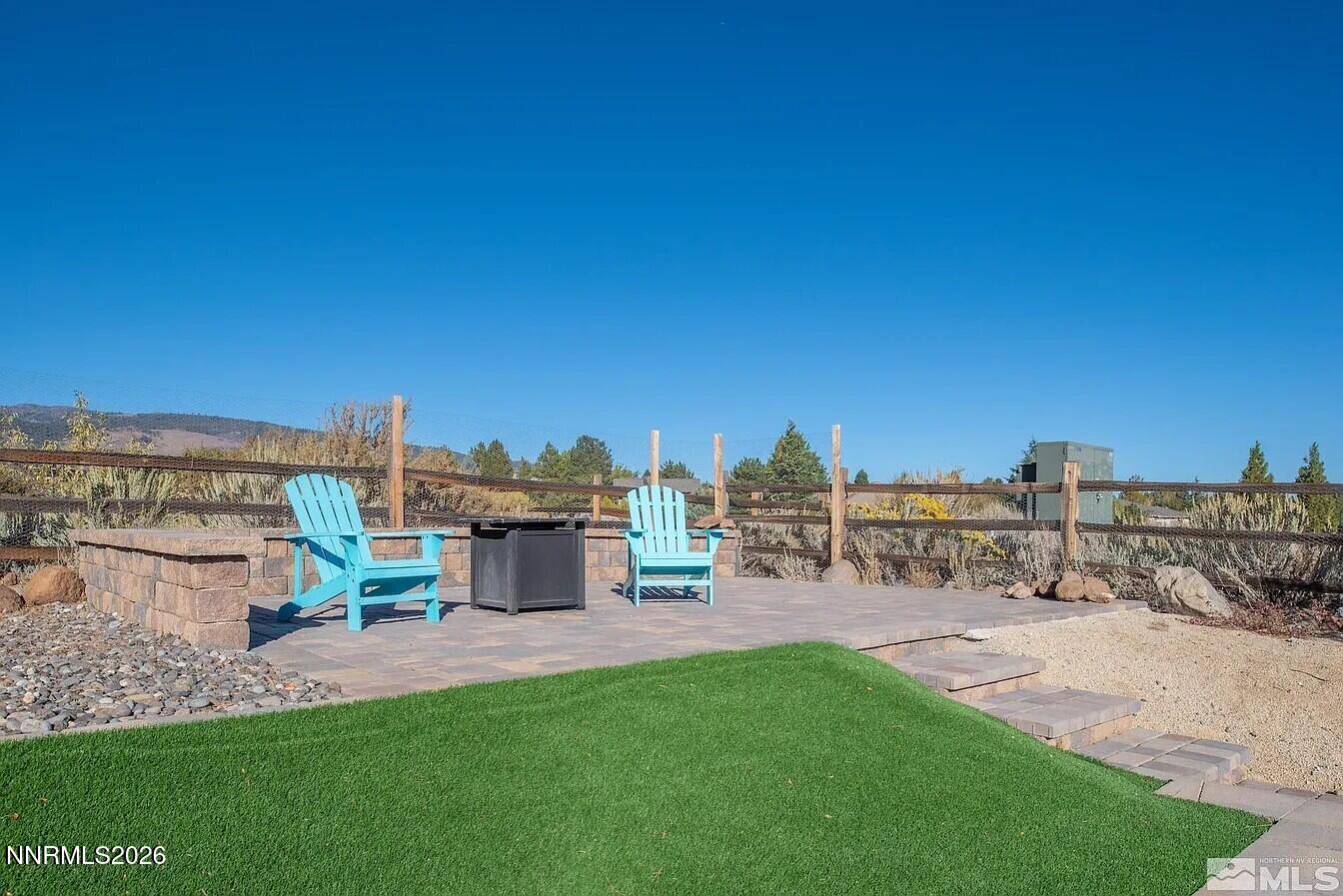 3945 Aspen Reno, NV 89511 - Photo 21 of 21 a view of a garden with a bench and lawn chairs