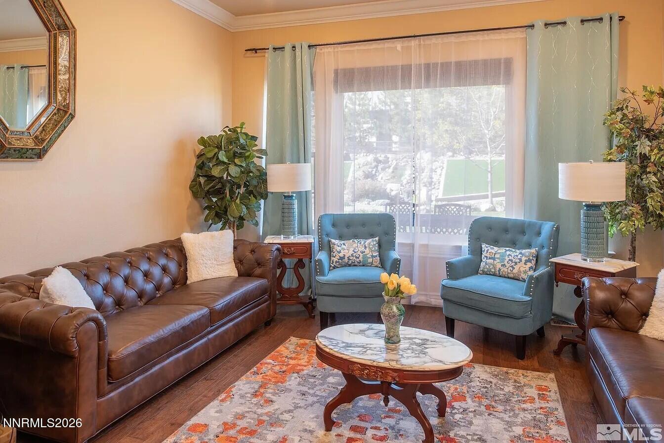 3945 Aspen Reno, NV 89511 - Photo 8 of 21 a living room with furniture a rug a lamp and a window