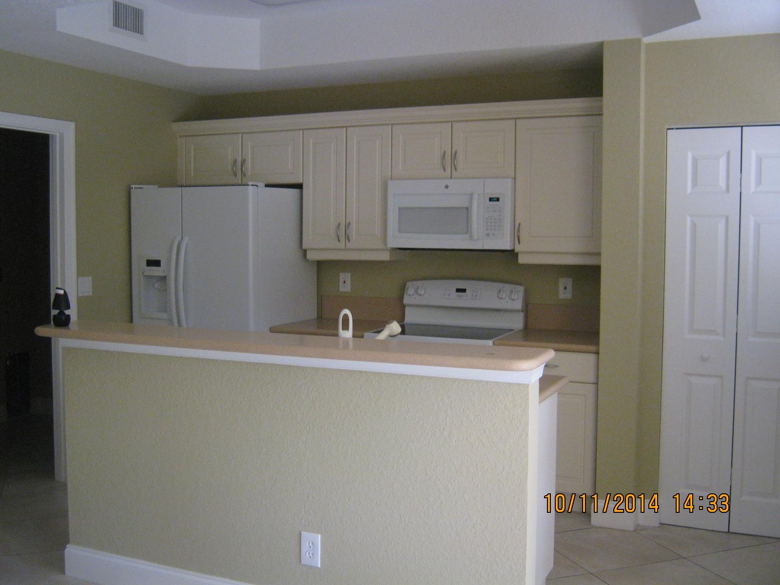 2896 Hidden Hills Road, Unit 1002 West Palm Beach, FL 33411 - Photo 3 of 9 10 11 kitchen