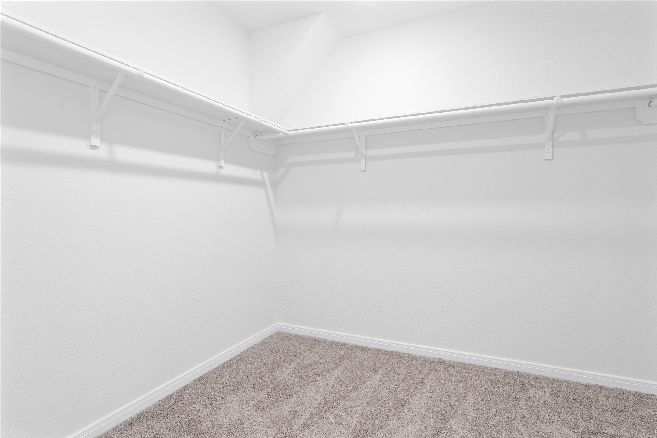 6410 Kentfield Drive Rosharon, TX 77583 - Photo 16 of 25 Look at this immaculate closet! With high shelving, multiple rows to hang clothing, you are sure to have enough room for all your belongings!