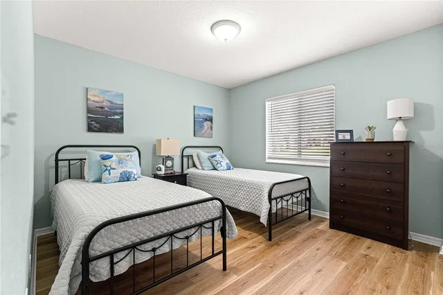 a bedroom with a bed and furniture