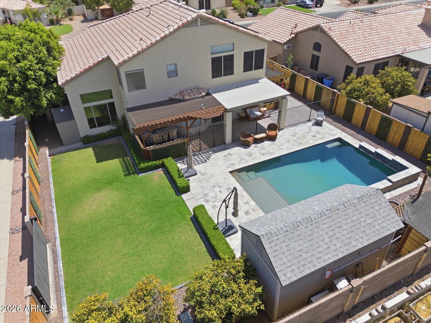 1894 East Mineral Road Gilbert, AZ 85234 - Photo 40 of 48 an aerial view of a house with a garden and swimming pool