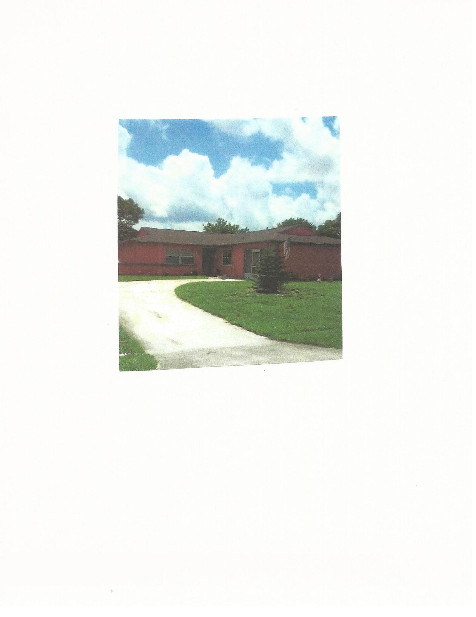 213 Southwest Homeland Road Port St. Lucie, FL 34953 - Photo 1 of 1 Front view