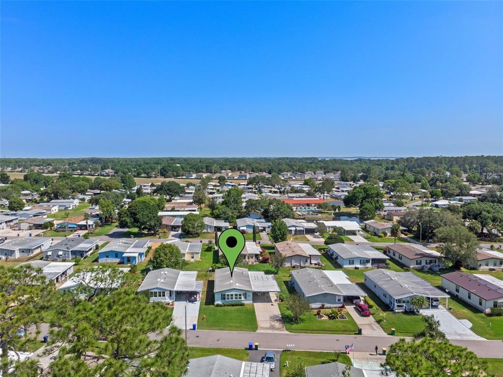 3026 Myakka River Road Tavares, FL 32778 - Photo 28 of 49 an aerial view of residential houses with city view