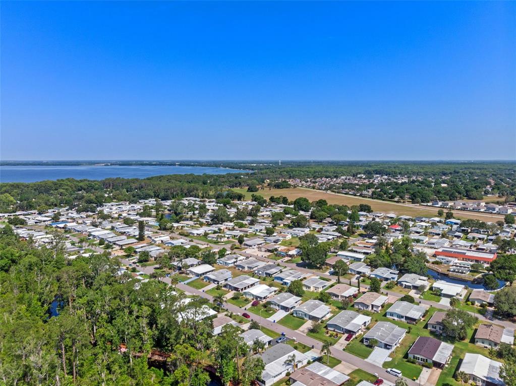 3026 Myakka River Road Tavares, FL 32778 - Photo 31 of 49 an aerial view of residential houses with city view