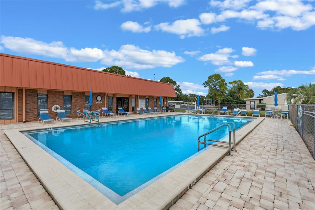 3026 Myakka River Road Tavares, FL 32778 - Photo 48 of 49 a view of swimming pool with outdoor seating