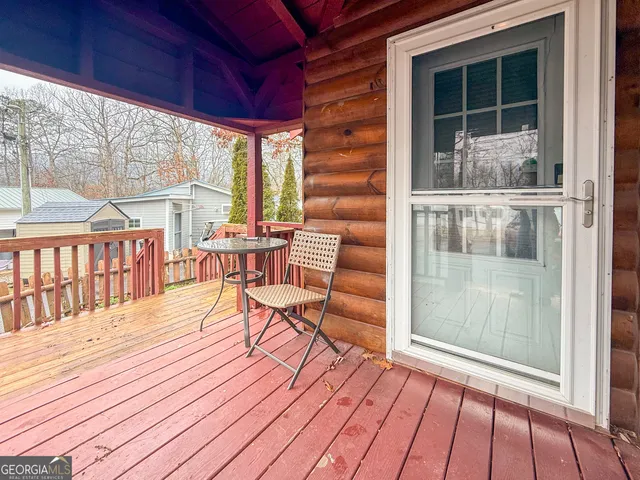 a balcony with wooden floor