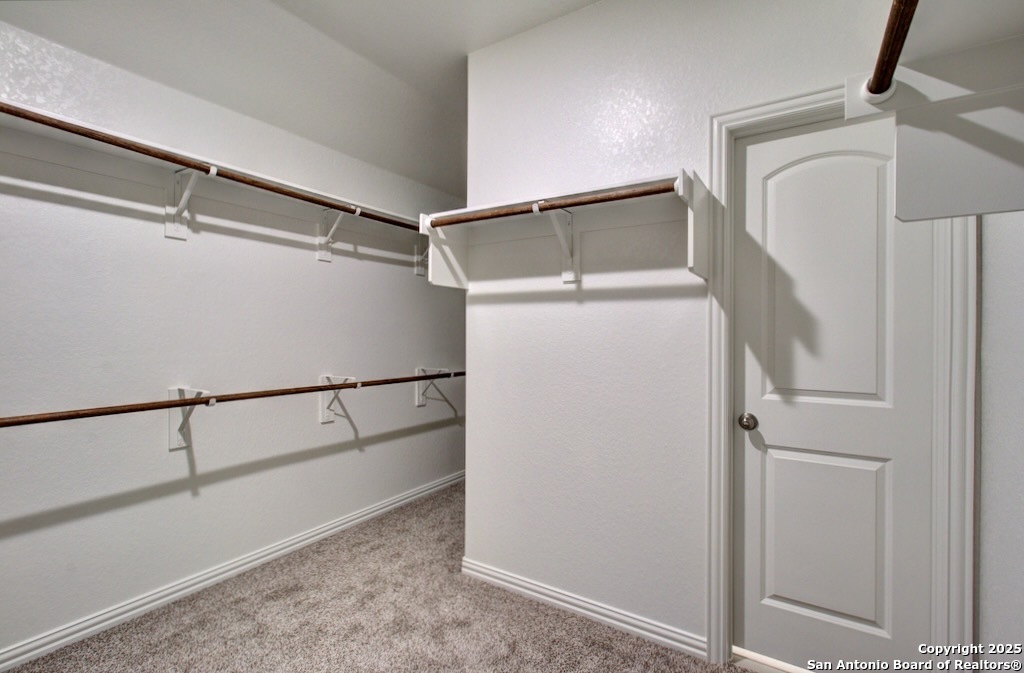 2118 Shepards Street Seguin, TX 78155 - Photo 22 of 22 a view of walk in closet with empty racks