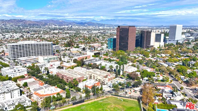 a view of a city with tall buildings