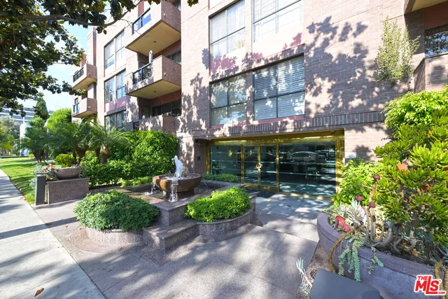 a swimming pool with outdoor seating and yard